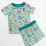 Children's pajama set with animal pattern on a white background