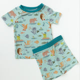 Children's pajama set with animal pattern on a white background