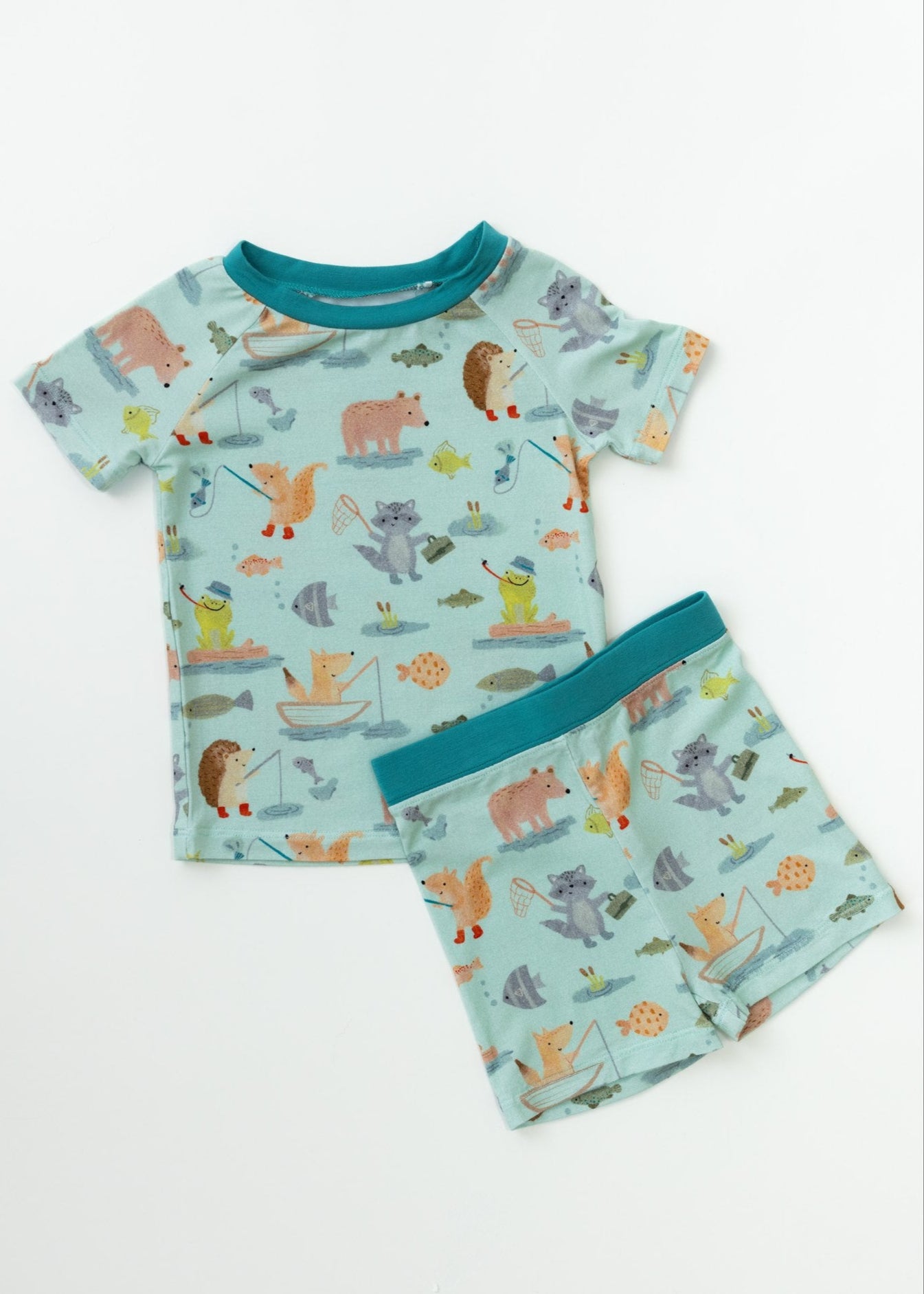 Children's pajama set with animal pattern on a white background